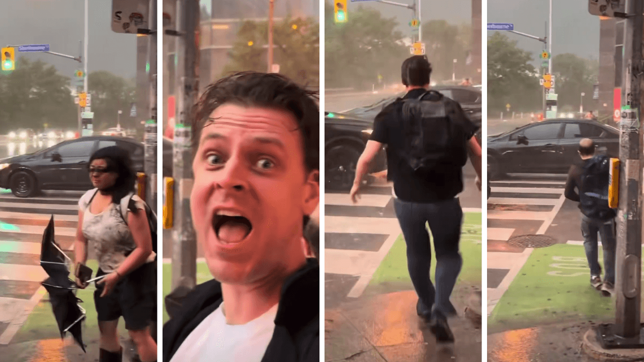 Pedestrian Struggles To Cross Toronto Street In Severe Wind And Rain